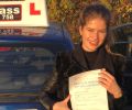 Tayla with Driving test pass certificate